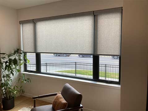 Window with roller shades