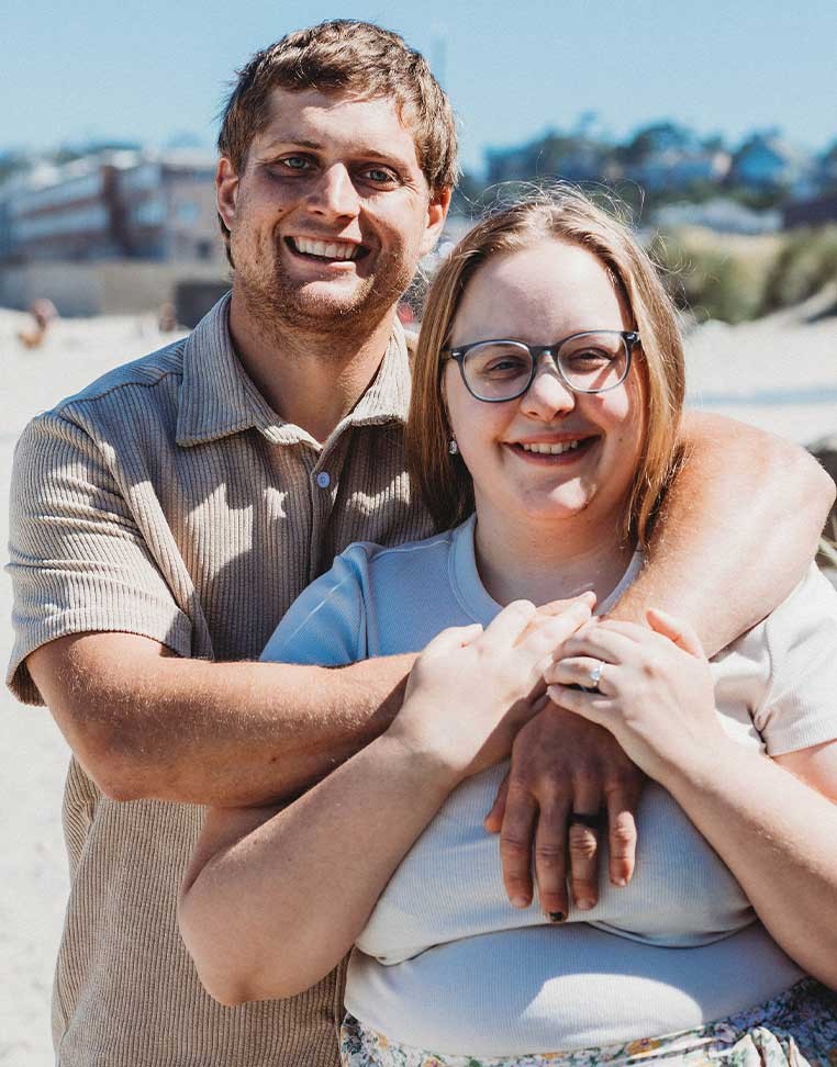 smiling couple on the beach